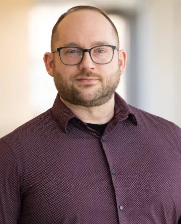 Portrait of Joshua Gelinske, Co-Founder of Josda